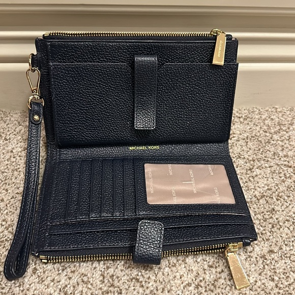 Navy Michael Kors wristlet with double zippers, cc holders and snaps close - Picture 2 of 3